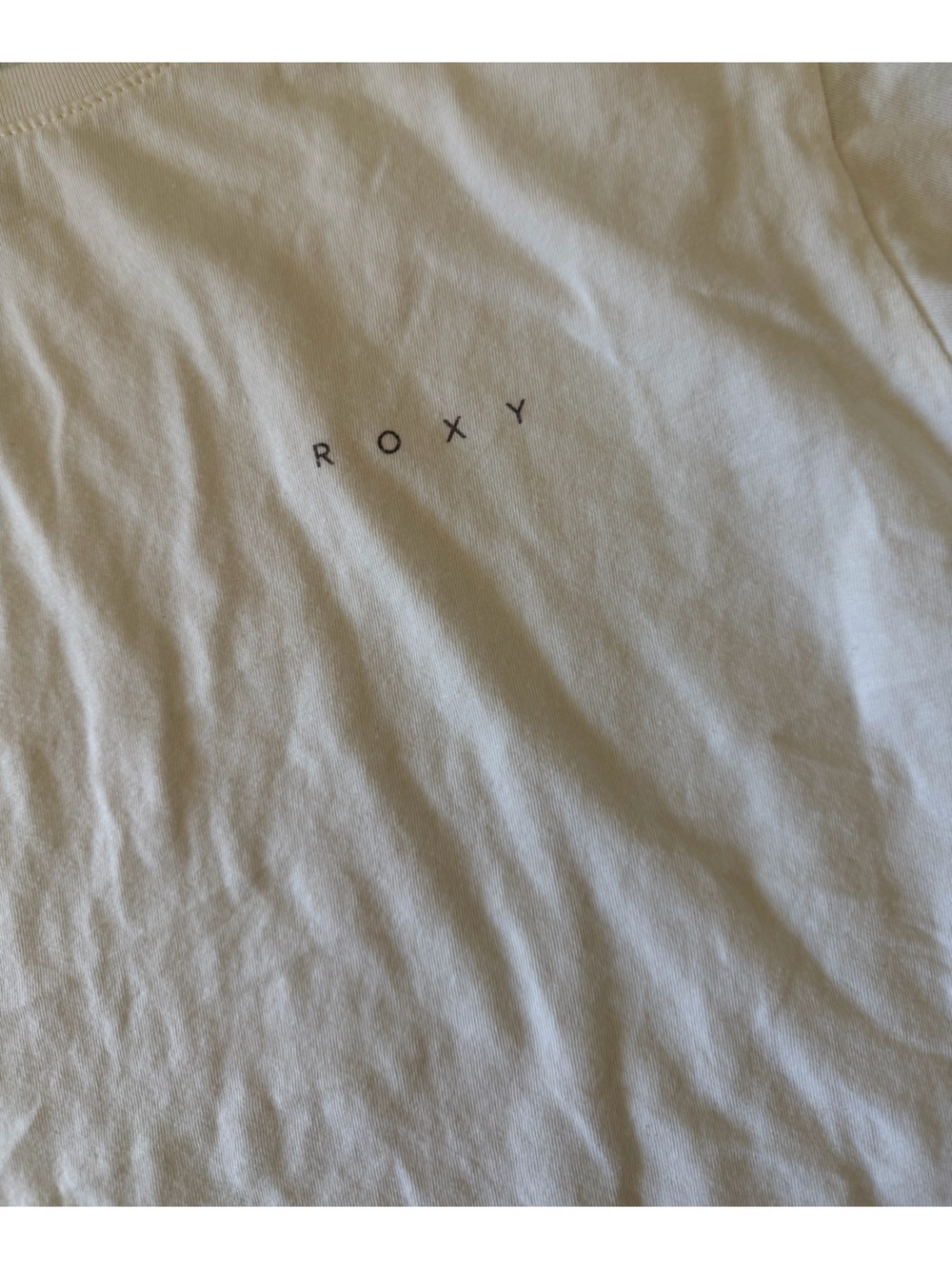 Roxy White Tee with Vertical Black Logo
